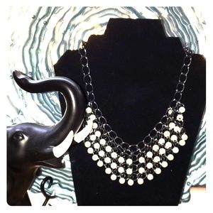 Full Faux pearl necklace.